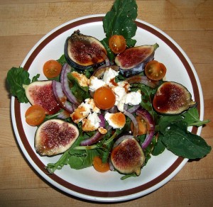 Fig, tomato, cheese salad dressed with cider syrup